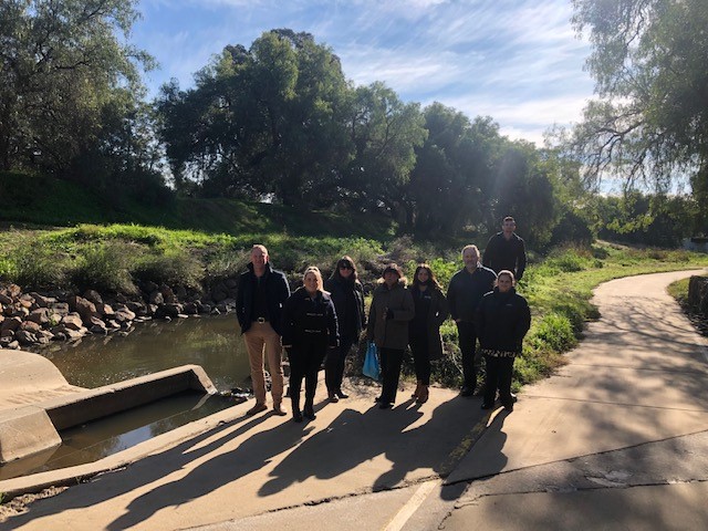 Asuria's Victoria Team standing together outside at The Wanyarram Dhelk Frog Ponds for NAIDOC Week 2021