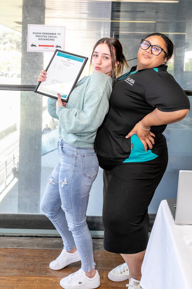 Job seeker Tori posing with her certificate alongside Asuria TTW  staff member joyce